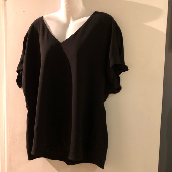Tops - Black top w/ bow ties & slits on the arms!! Large